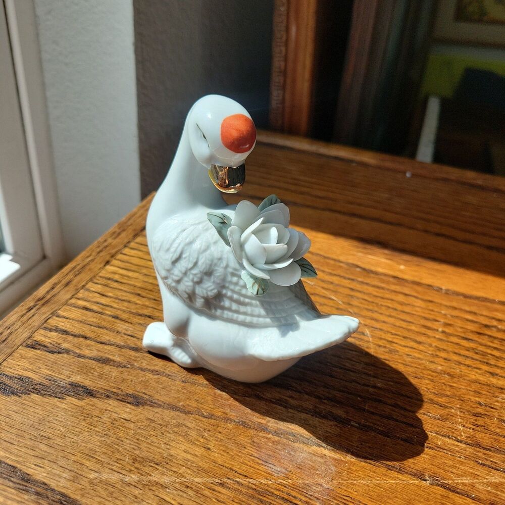 Vtg Asian Porcelain Swan figurine lotus on back and orange round spot on head